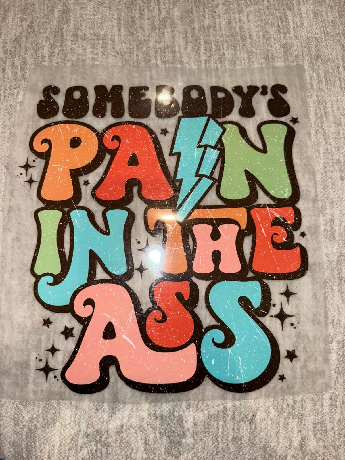 Somebody’s pain in..